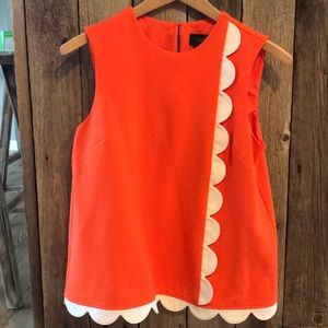 Victoria Beckham orange sleeveless shirt